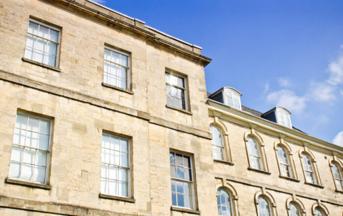 Tall stone buildings in Cirencester, UK